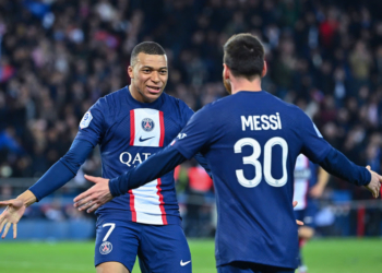 Kylian MBAPPE of PSG celebrates a goal with Lionel MESSI of PSG during the Ligue 1 Uber Eats match between Paris and Lens on April 15, 2023 in Paris, France. (Photo by Anthony Dibon/Icon Sport)